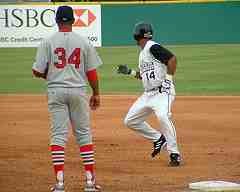 baserunner returning to first base